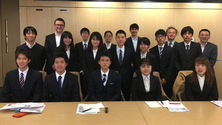Students with speakers - Mr South, Corporate Affairs Manager; Mr Matsubara, Senior Project Manager – Integrated Transportation Systems