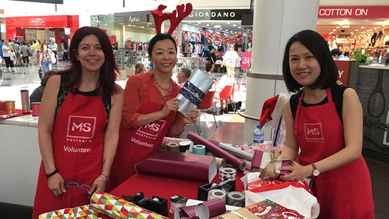 Employee volunteers in the Christmas spirit