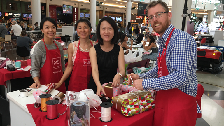 Employee volunteers in the Christmas spirit