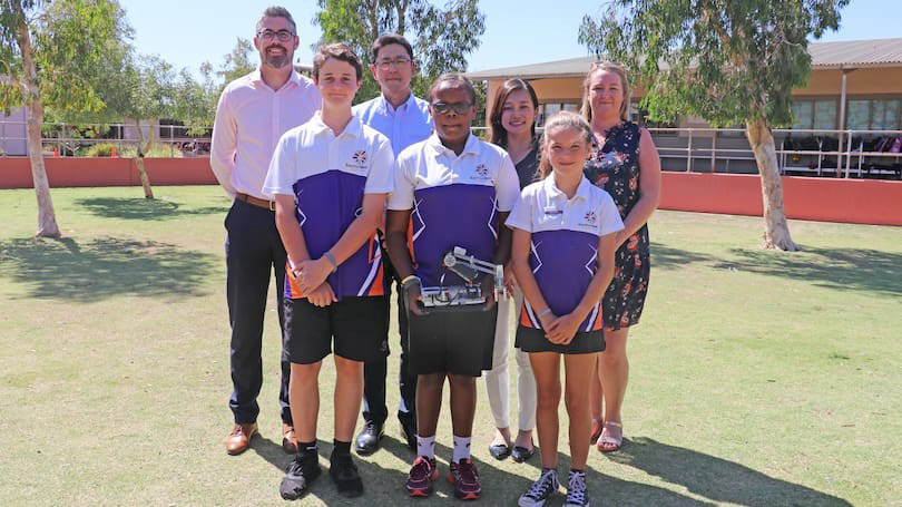 Scitech manager partnerships and alliances Rich Williams, Lucas Woodvine, Mitsui Iron Ore Development general manager business section Tak Takahashi, Mitsui business analyst Miyu Endo and Baynton West Primary School students and deputy principal.