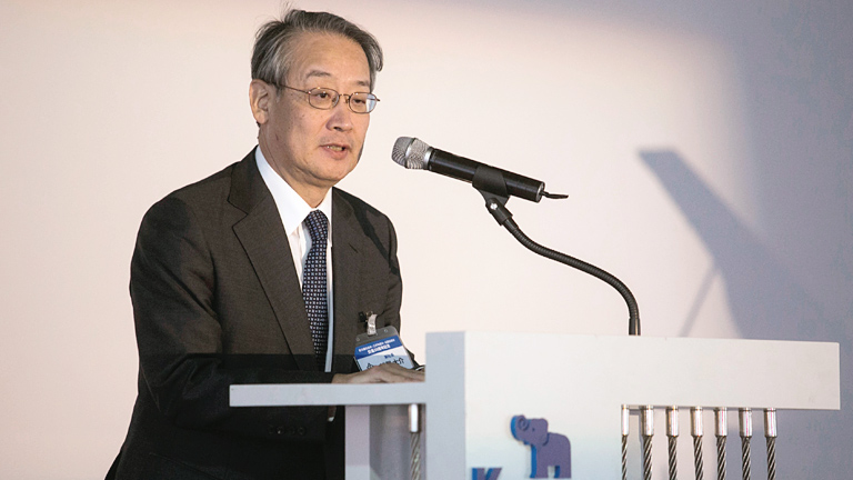 Executive Vice President Saiga making a speech at the ceremony