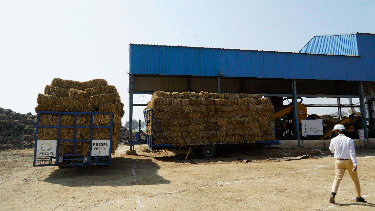 Rice straw processing at Kulbucharan Briquettes plant (Punjab state)