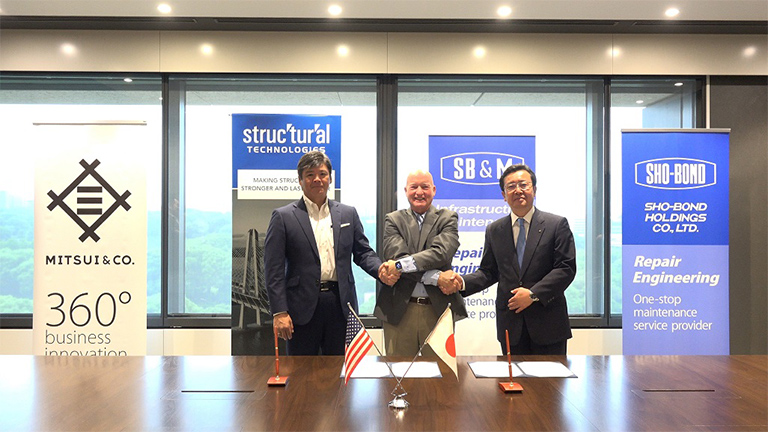 Pictured are (L-R) Koichi Fujita, COO, Iron & Steel Products BU of Mitsui & Co., Ltd., Peter Emmons, CEO of Structural Group, Inc., and Tatsuya Kishimoto, President of SHO-BOND Holdings, Ltd.